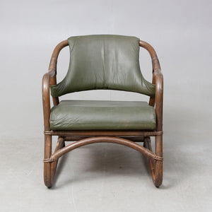 Rotan fauteuil met groen lederen bekleding jaren 60. Zweeds ontwerp